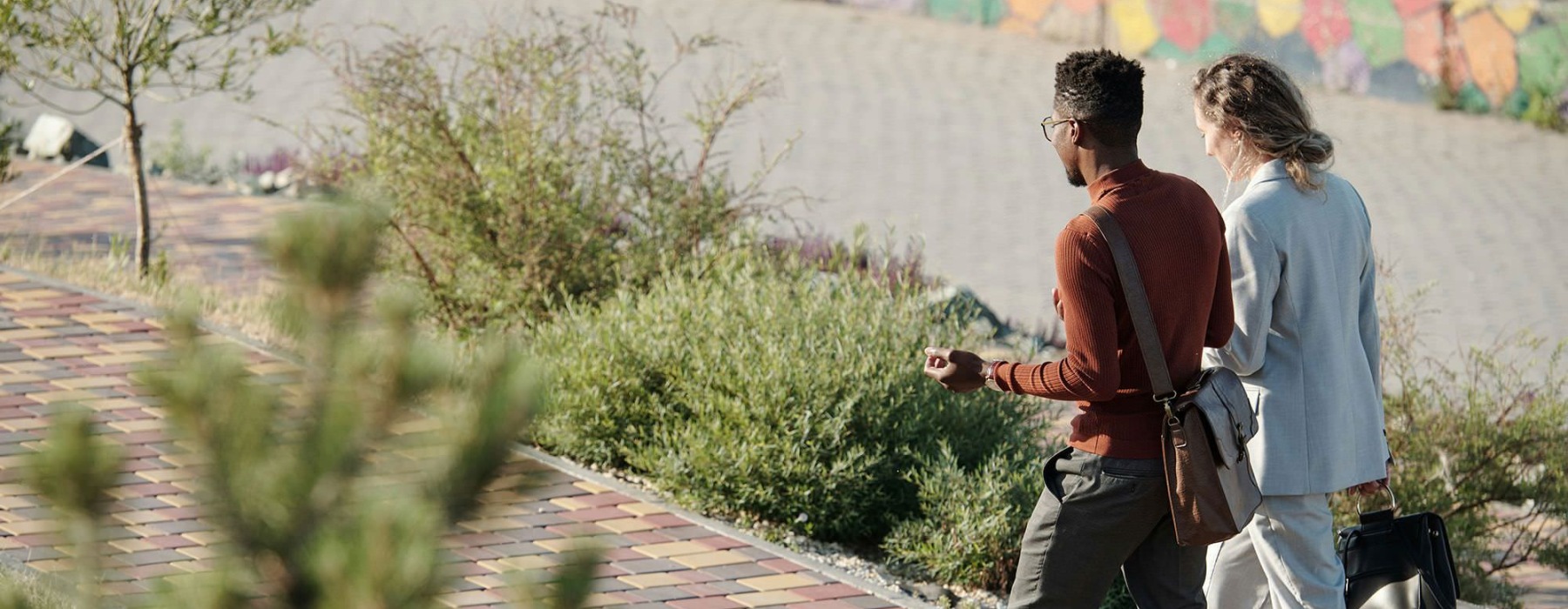 a man and a woman walking to work