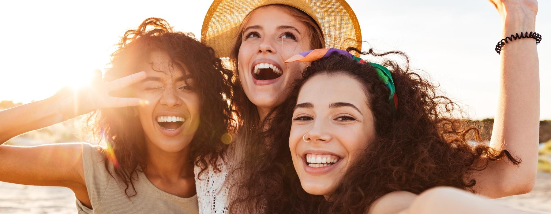 a group of women posing for a photo